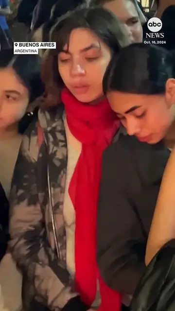 Video thumbnail for Fans gathered Wednesday night outside the Buenos Aires hotel where authorities say former One Direction star Liam Payne died after falling from the third floor. The singer was 31.