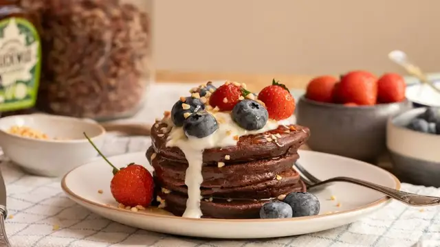 'Video thumbnail for Satisfy Your Sweet Tooth With These Protein-Packed Chocolate Pancakes'