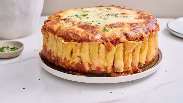 'Video thumbnail for Our Meaty Honeycomb Pasta Is Layered With Beef, Cheese, And Italian-American Goodness'