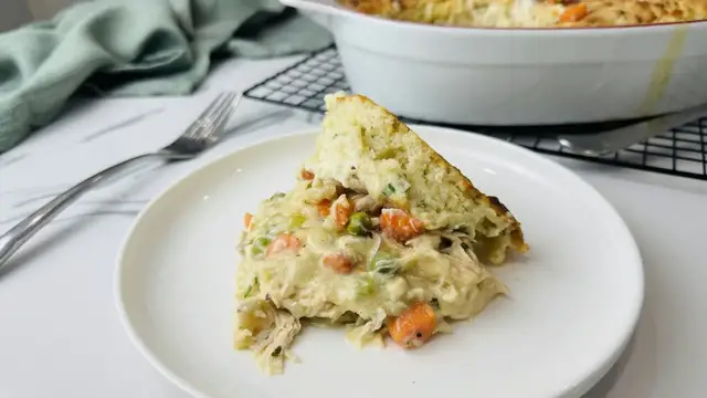 'Video thumbnail for This Chicken Cobbler Recipe Puts A Cheesy Spin On Classic Pot Pie'