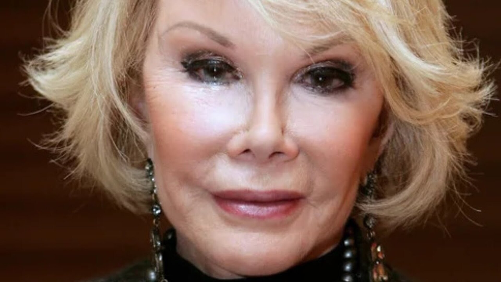 Video thumbnail for The Stunning Amount Of Plastic Surgery Joan Rivers Had During Her Life