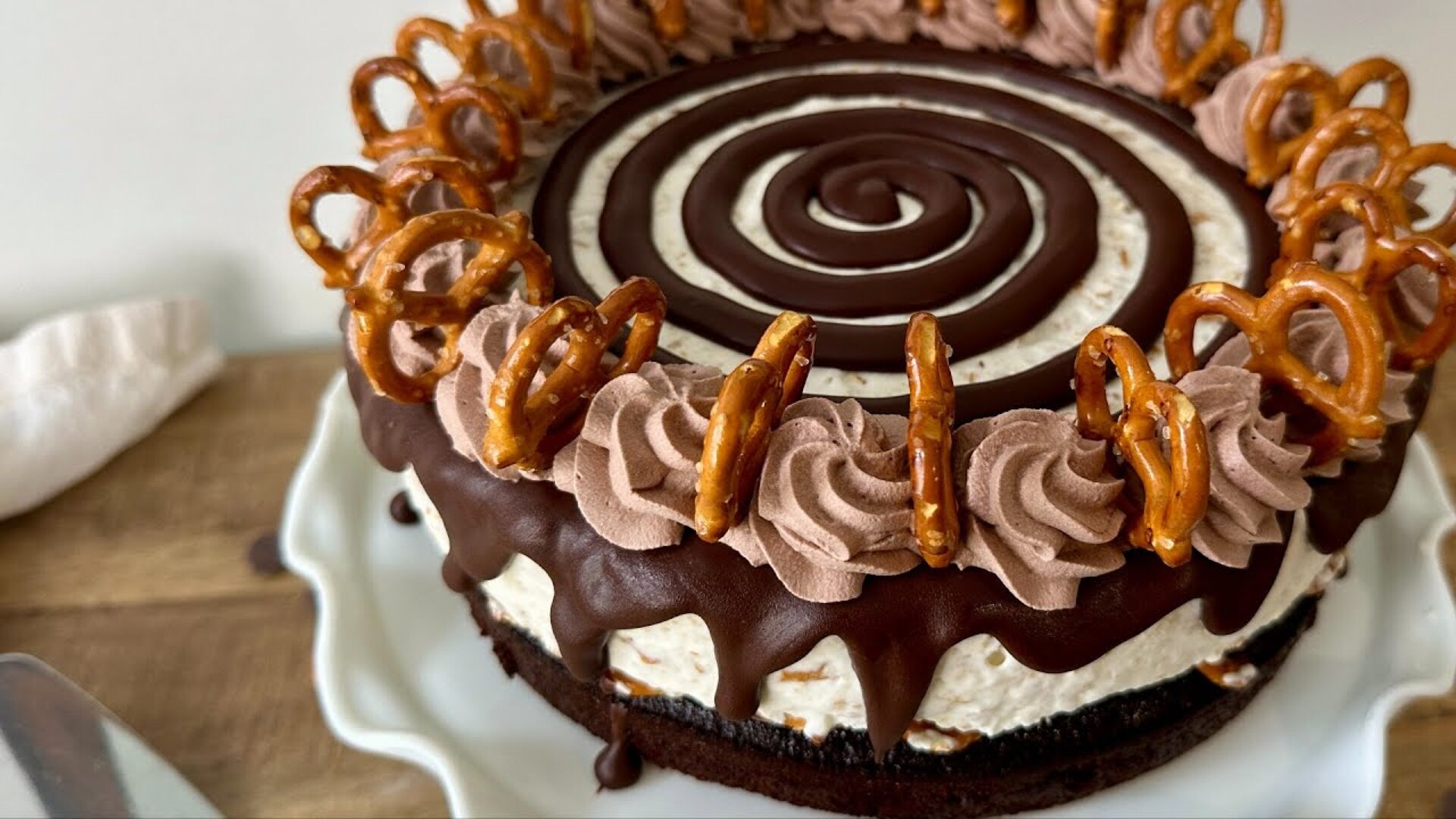 Video thumbnail for Chocolate-Covered Pretzel Ice Cream Cake Recipe