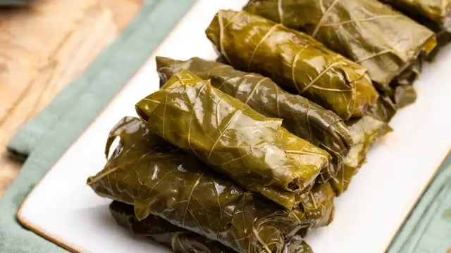 'Video thumbnail for Herby Ground Beef-Stuffed Grape Leaves Recipe'