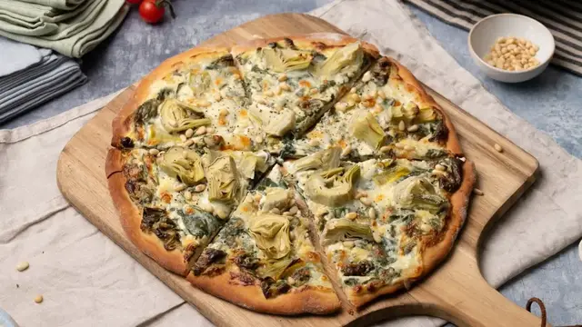 Video thumbnail for Extra Cheesy Spinach Artichoke Pizza Recipe