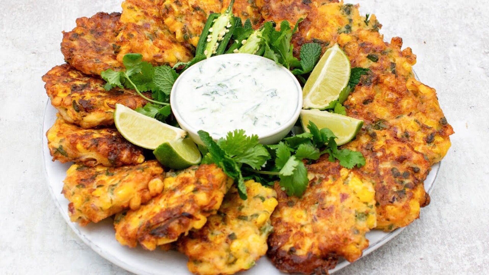 Video thumbnail for Corn And Jalapeño Fritters With Cooling Yogurt Dip Recipe