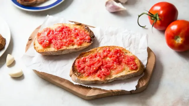 'Video thumbnail for Make Homegrown Tomatoes The Star In This 3-Ingredient Pan Con Tomate Recipe'