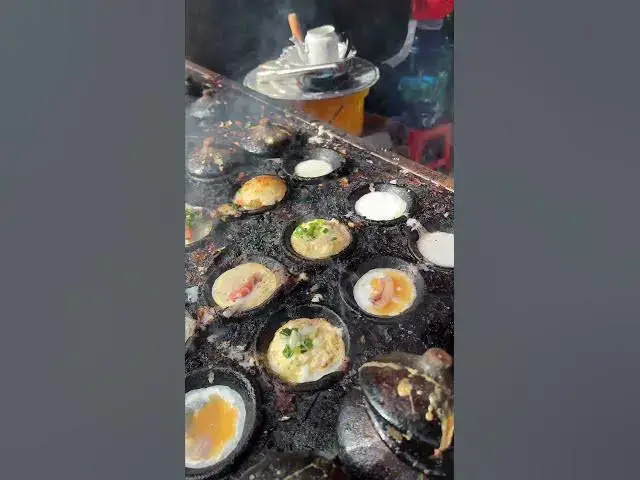 'Video thumbnail for Banh Can: Crispy Vietnamese Seafood Pancakes on Binh Hung Island  #foodshorts #streetfoodvietnam'