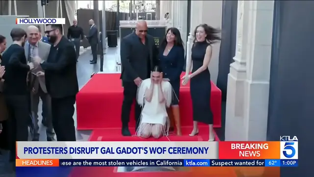 Video thumbnail for Protesters Disrupt Gal Gadot’s Hollywood Walk of Fame Ceremony!
