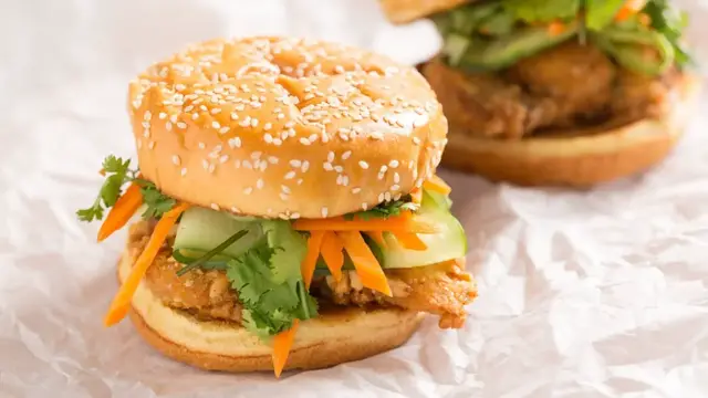 'Video thumbnail for Satay-Inspired Peanut-Crusted Chicken Sandwich Recipe'