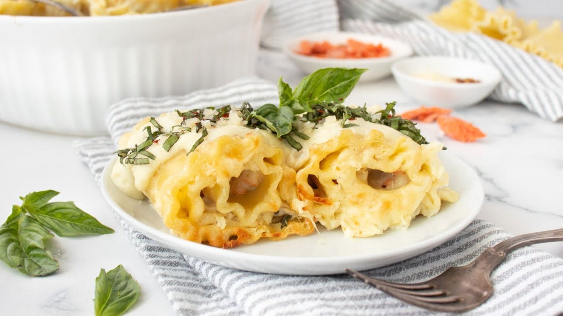 Video thumbnail for Garlicky Salmon Alfredo Lasagna Rolls Recipe