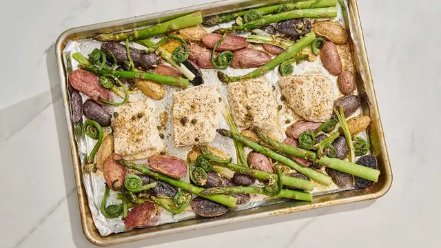 Video thumbnail for Sheet Pan Garlic Butter Halibut With Spring Vegetables Recipe