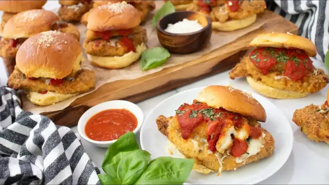 'Video thumbnail for We Made Chicken Parm Sliders Over-The-Top With Gooey Mozzarella Sticks Inside'