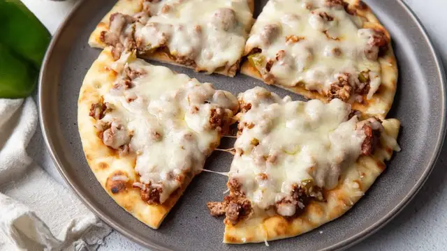 Video thumbnail for Cheesesteak-Style Sloppy Joe Flatbreads Recipe