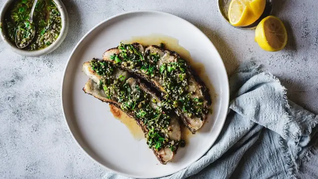 'Video thumbnail for Grilled Chilean Sea Bass With Garlic Butter Recipe'