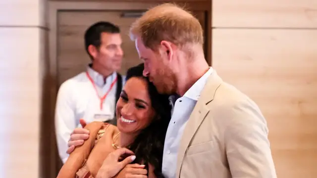 'Video thumbnail for Prince Harry & Meghan's Latest PDA Is Causing A Stir'