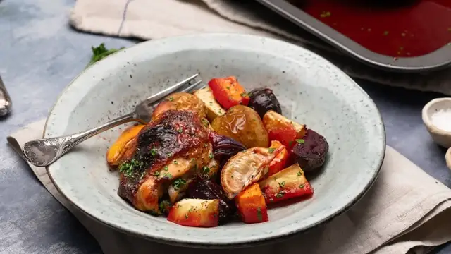 'Video thumbnail for Sheet Pan Honey Lemon Chicken With Roasted Vegetables Recipe'