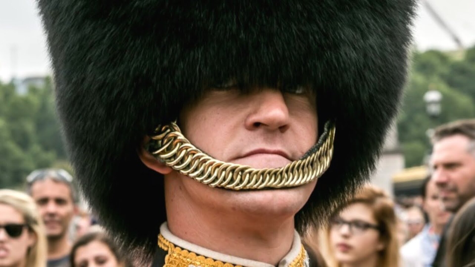 Video thumbnail for Why British Guards Wear Bearskin Hat Straps Below Their Lip