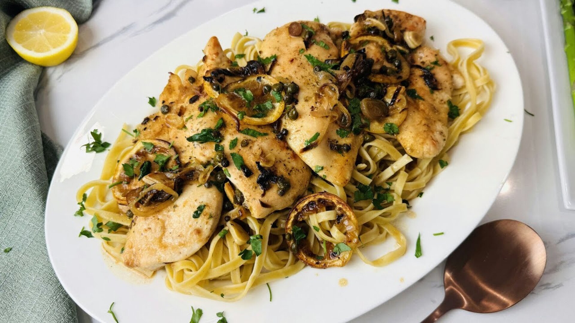 Video thumbnail for Lemony Sheet Pan Chicken Piccata Recipe