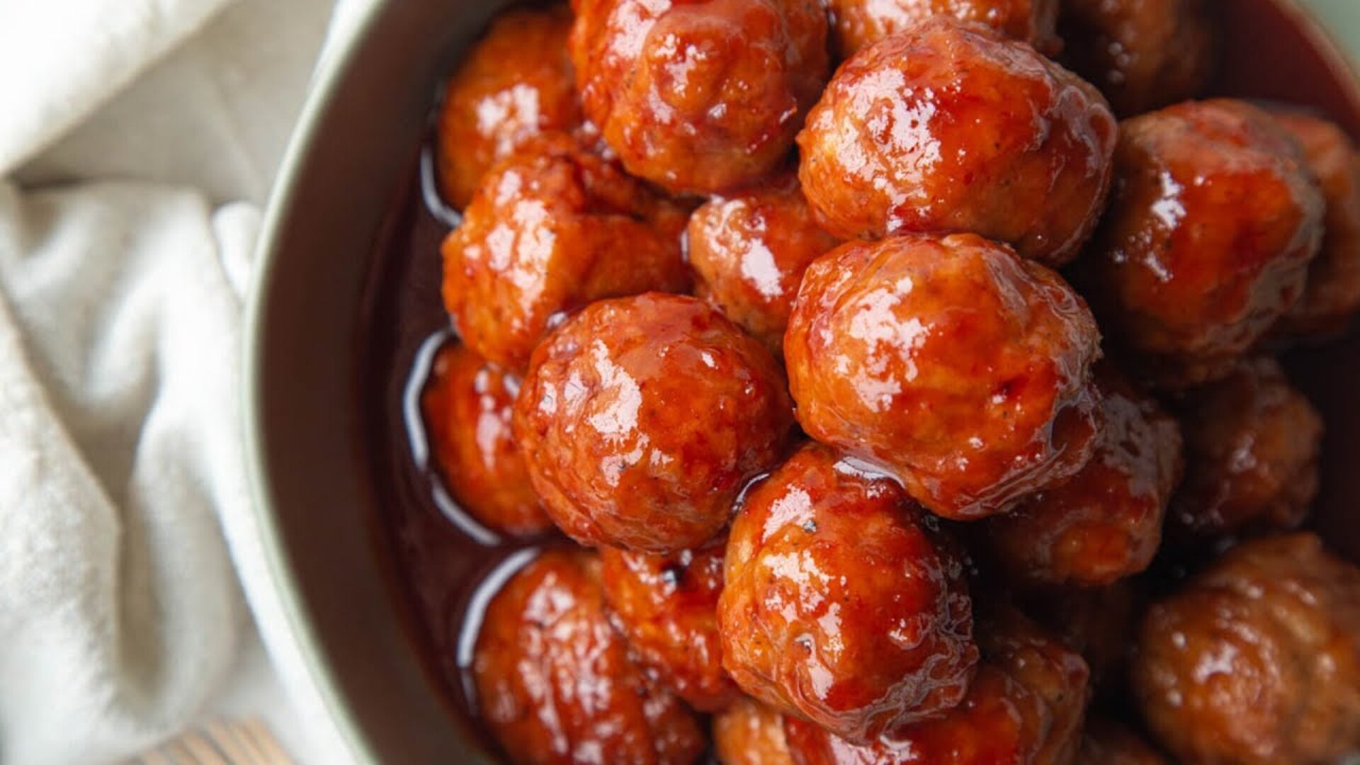 Video thumbnail for Party-Pleasing Grape Jelly Meatballs Recipe