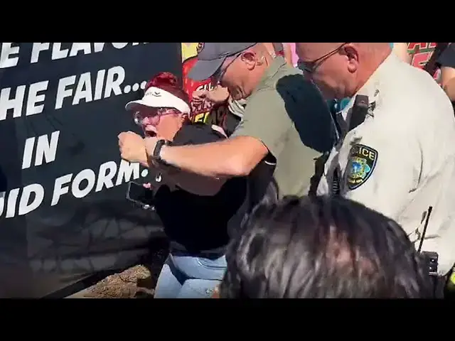 Video thumbnail for 'Get The F**k Off Of Me' - Chaos Ensues As Trump Visits Iowa State Fair